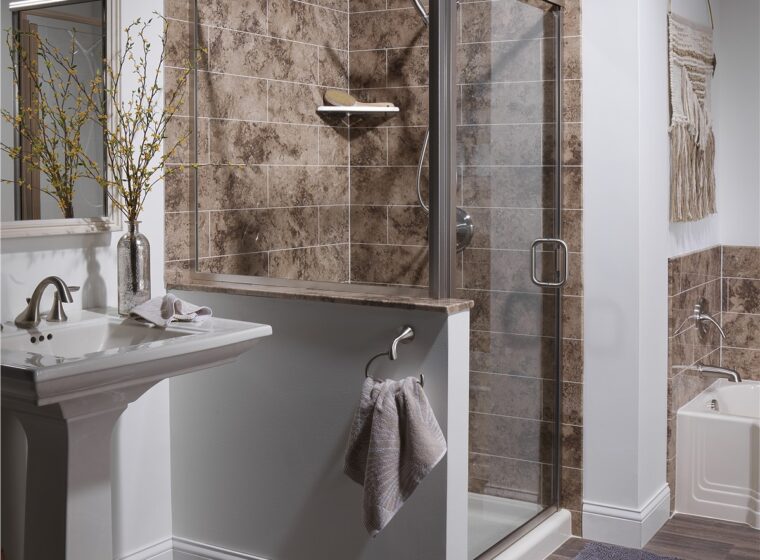Unique corner shower set up with modern bathroom fixtures