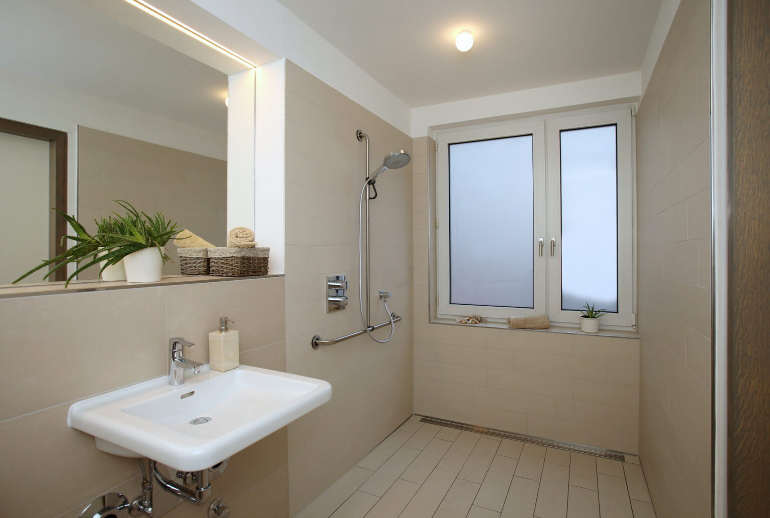barrier-free bathroom renovations bowling green ky - a barrier-free bathroom showing a sink and a walk-in shower large enough to accommodate wheel chair