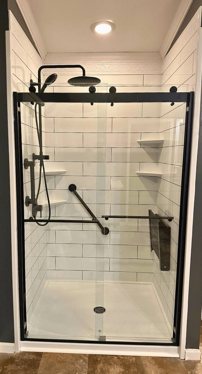 Senior Bathroom Remodel Oakland KY - low-step walk-in shower black and white