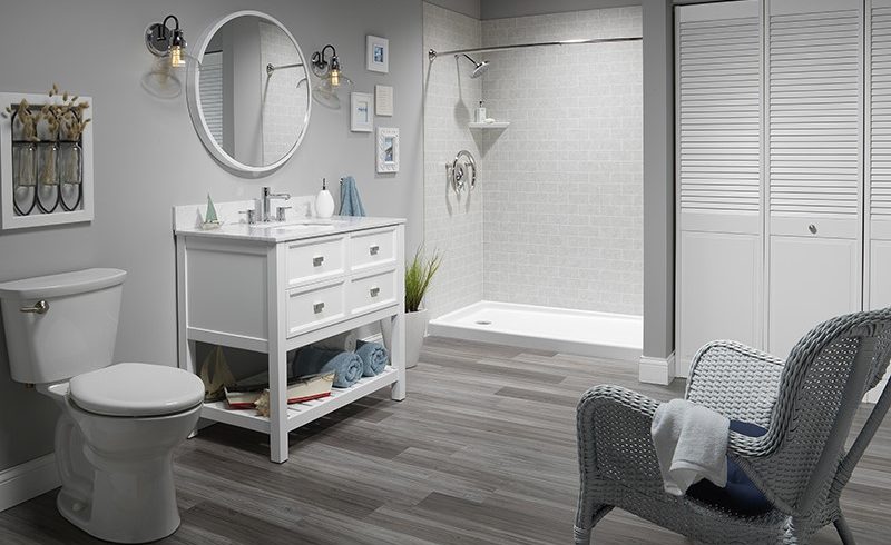 Black and white bathroom with inlaid shower and folding door closet