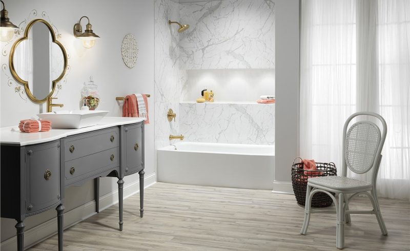 Elegant bathroom in rococo style with marble shower and recessed shelf