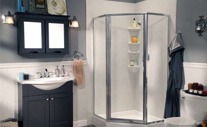 Corner shower with hinged door and multiple shelves